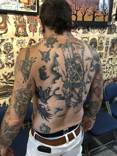 Work by Times Square Tattoo
