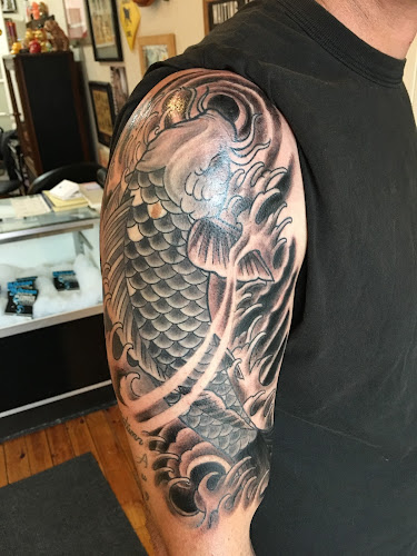Work by 5 Monkeys Tattoo