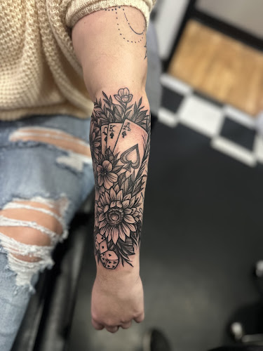 Work by Castle of Color Tattoo & Body Piercings
