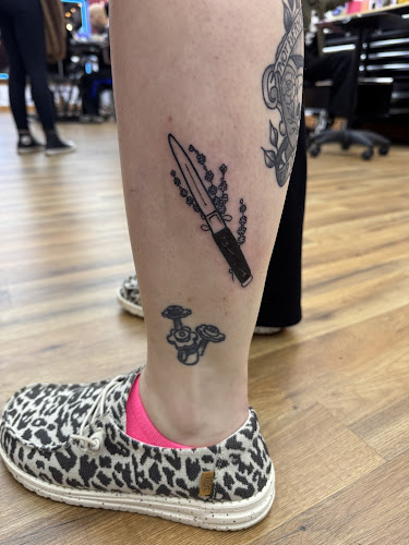 Work by Blue Horseshoe Tattoo & Body Piercing
