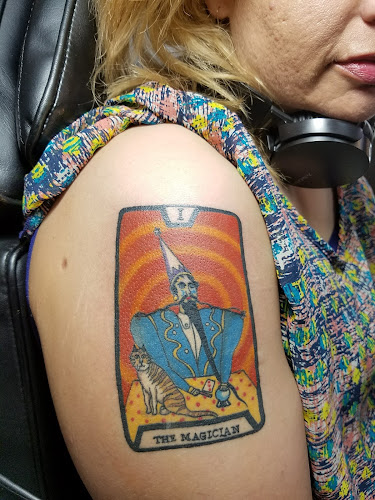 Work by Screamin' Tiki Tattoo