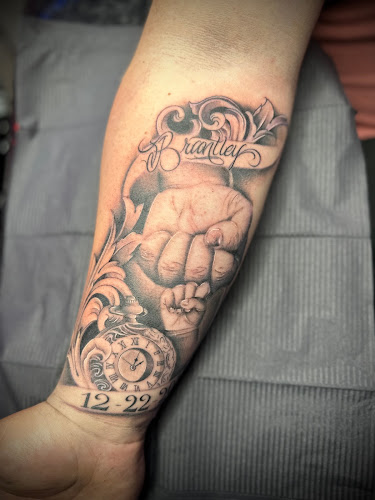Work by Spilled Ink Tattoo
