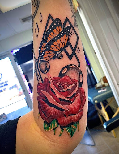 Work by Out of line tattoo