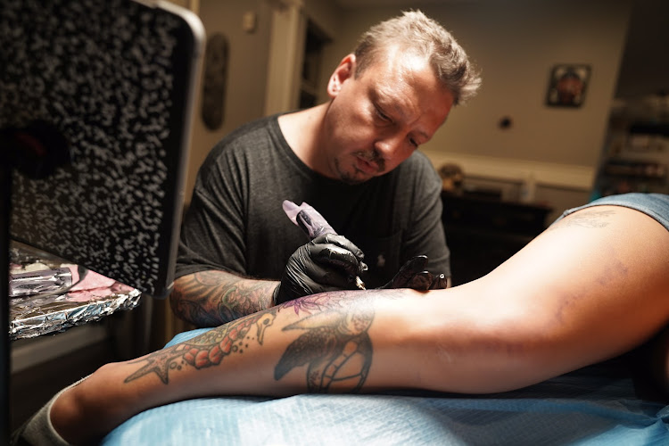 Work by Orpheus Tattoo Studio NJ