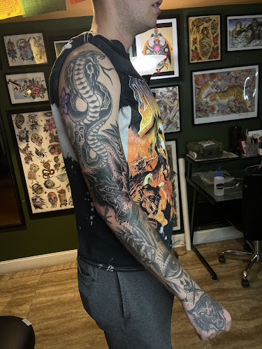 Work by Breakthrough Tattoo