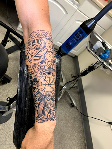 Work by Black Diamond Custom Tattoos