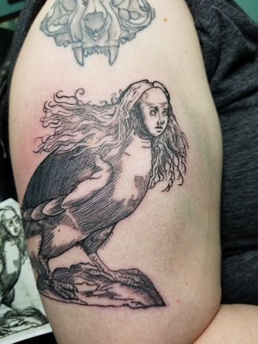 Work by Silver Rooster Tattoo