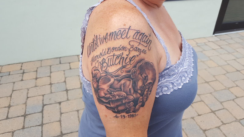 Work by Dawn of Time Tattoo