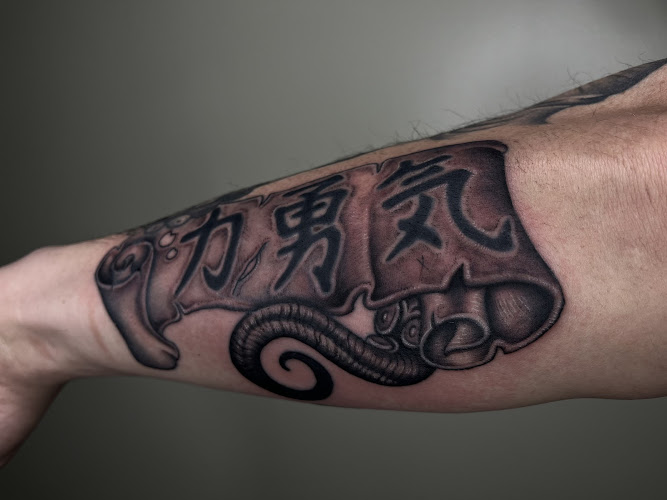 Work by Tinta Sagrada Tattoo and Art Collective