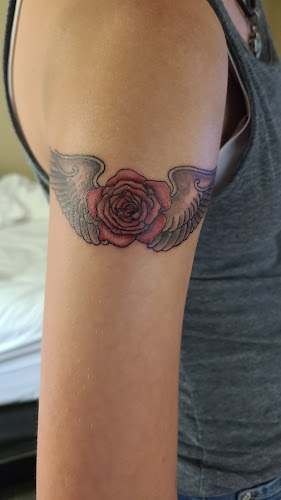 Work by Cynical Tattoos Shop