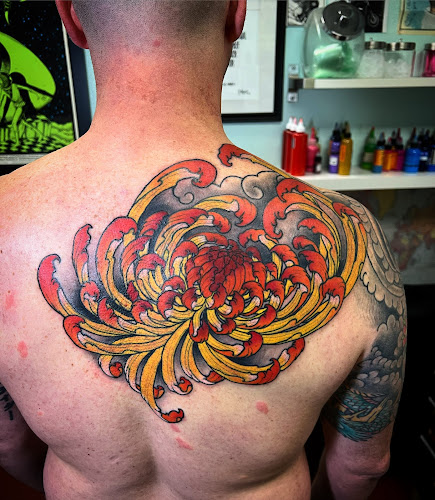 Work by Kathouse Inc. Tattoo