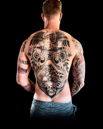 Work by Nite Owl Tattoo