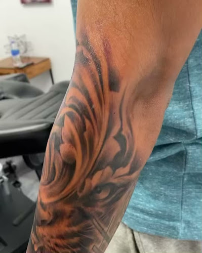 Work by Almighty ink