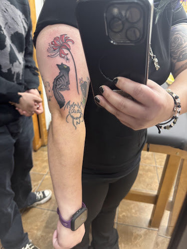 Work by Atomic Lotus Tattoo