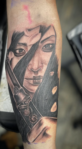 Work by Infamous Ink Tattoo Tinker AFB