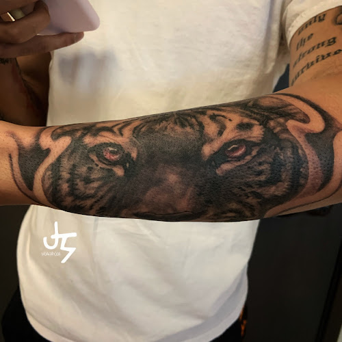 Work by Ink Plug Tattoo Co.