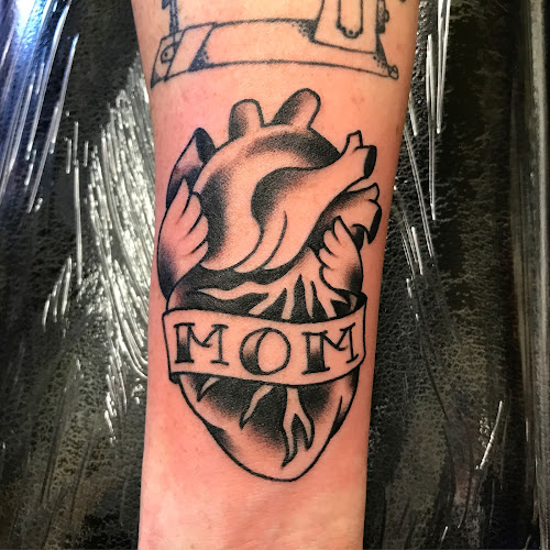 Work by No Regrets Tattoo