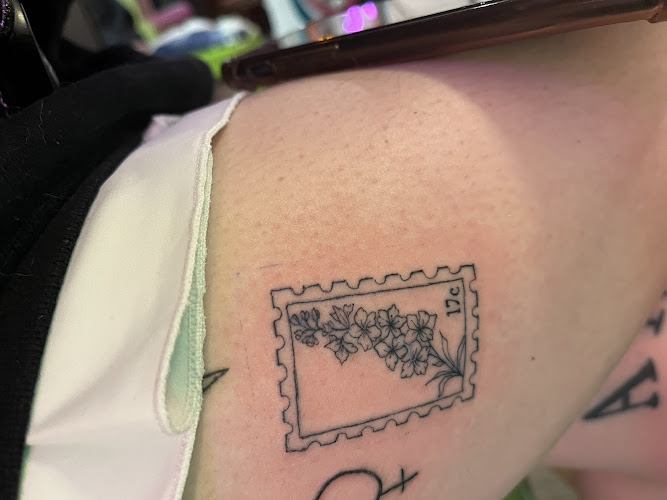 Work by Inky Disco Tattoo