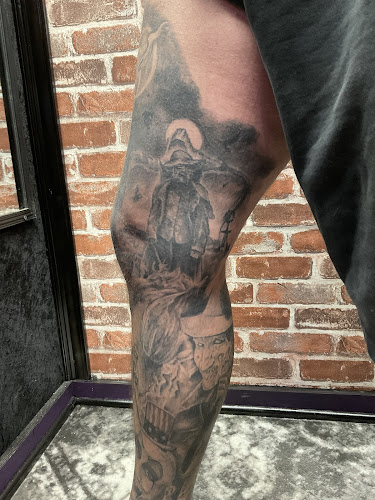 Work by Needle Bar Tattoo Parlor