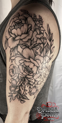 Work by Omega Point Tattoo