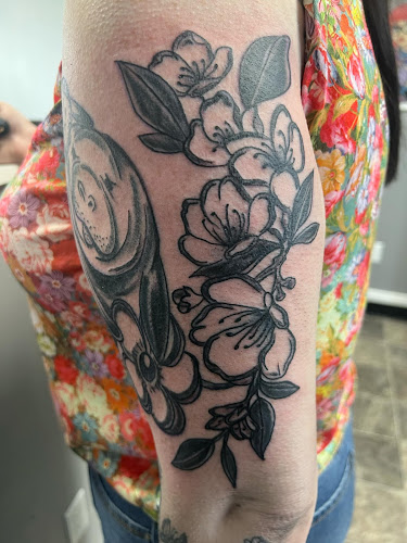 Work by Enchanted Rose Tattoo Parlor