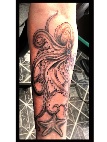 Work by Genuine Tattoo Co LLC