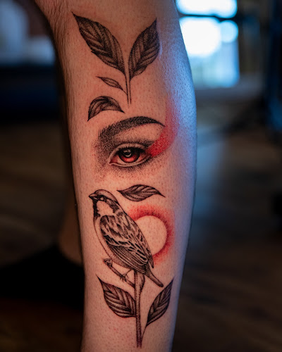Work by White Rabbit Tattoo Company