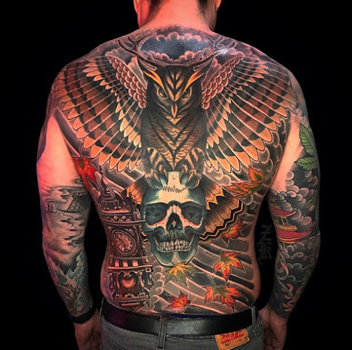 Work by Two Muses Tattoo