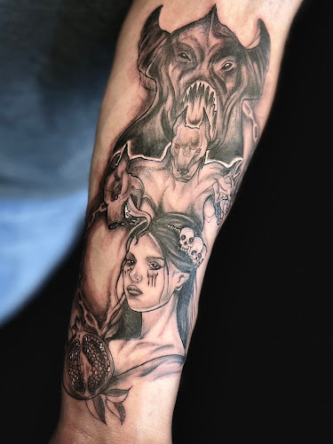 Work by Saturn Tattoo