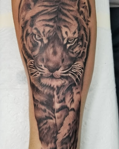Work by Purple Rose Tattoos & Piercings