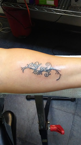 Work by American Made Tattoos