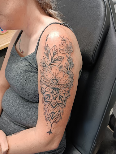Work by Twisted ink tattoo