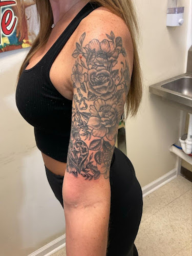 Work by Tooth & Nail Tattoo & Piercing
