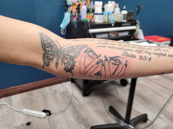 Work by Tenth Gate Tattoo