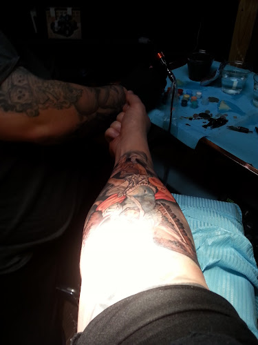 Work by Hallows Eve Tattoo