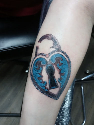 Work by Outcast tattoo studio