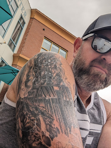 Work by One Love Tattoos