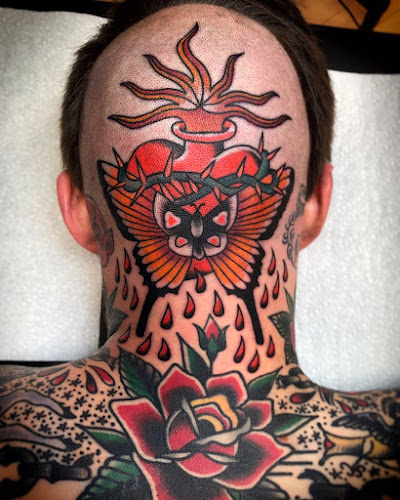 Work by Floating World Tattoos and Body Piercing