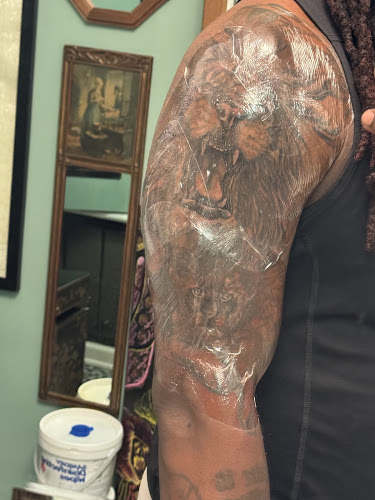 Work by Sacred Bond Tattoo Company