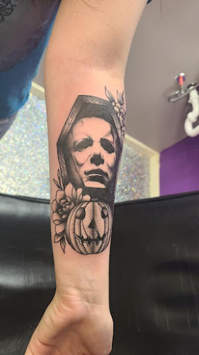 Work by Artistic Armor Tattoo Parlor