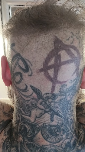 Work by Golden Panther Tattoo