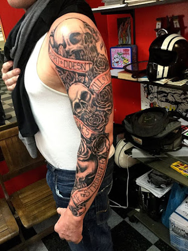 Work by Shakey's Deluxe Tattoo