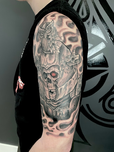 Work by Snaggletooth Tattoo