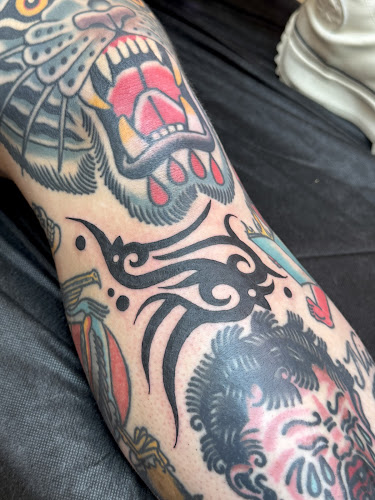 Work by Tiger Tail Tattoo