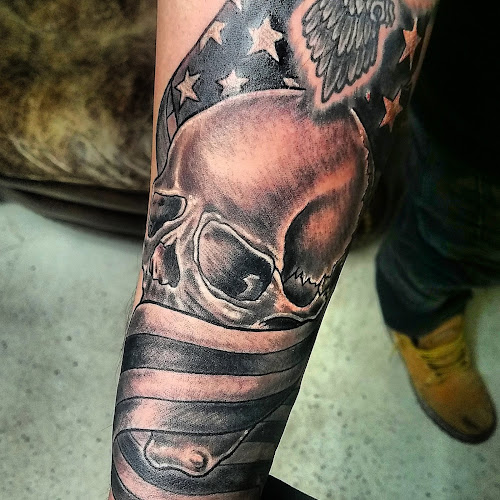 Work by Tattoo Warehouse AND Body Piercings