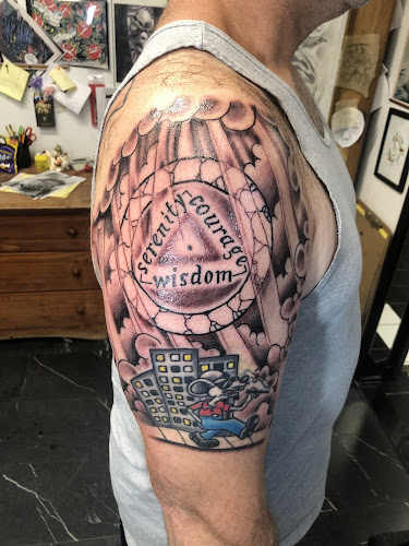 Work by Slingin' Ink Tattoo