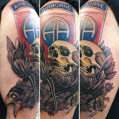 Work by Rougarou Collective Tattoo Shop