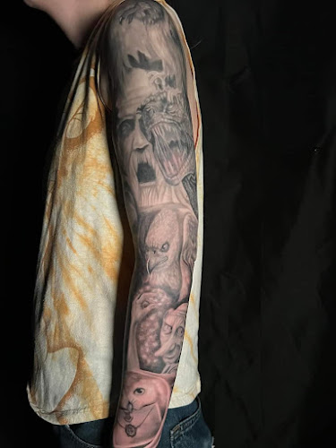 Work by Rosen Bridge Tattoo And Fine Art Collective