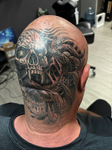 Work by Sacred Rites Tattoo