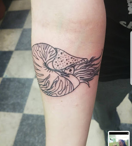 Work by Tip Top Tattoo
